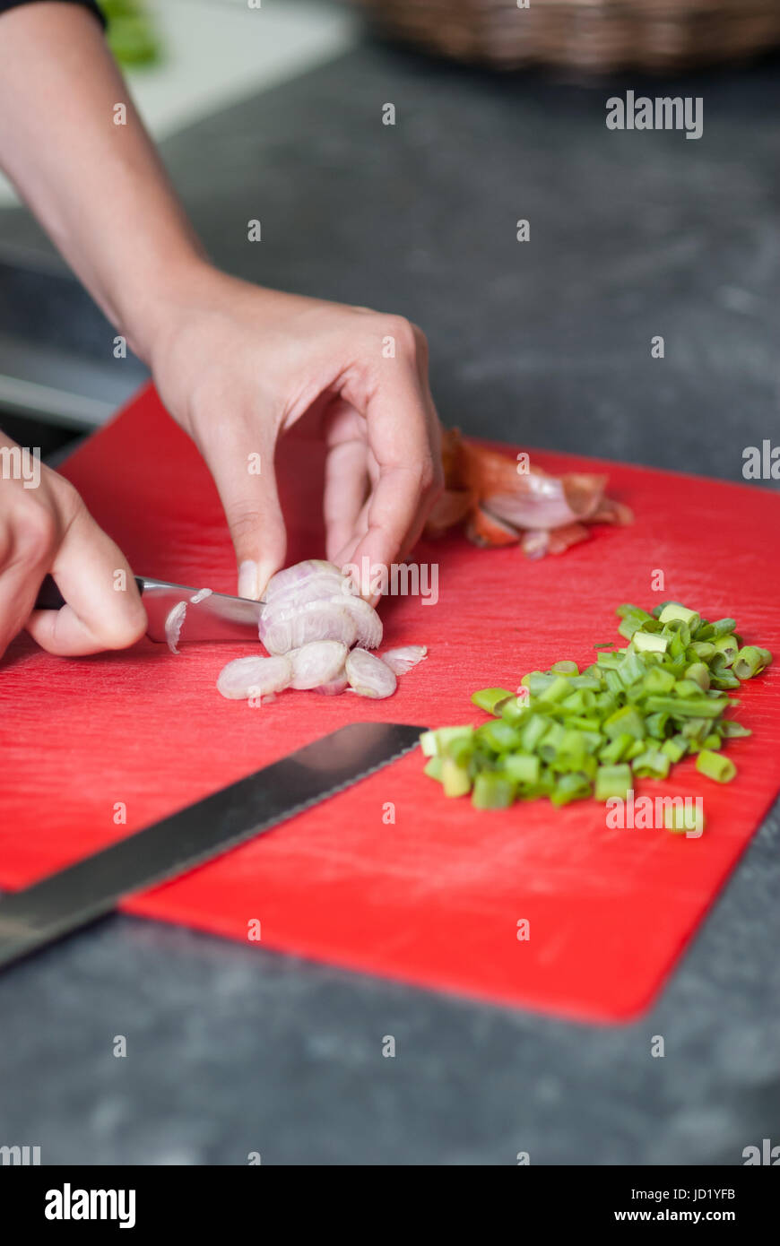 Woman peel onion hi-res stock photography and images - Alamy