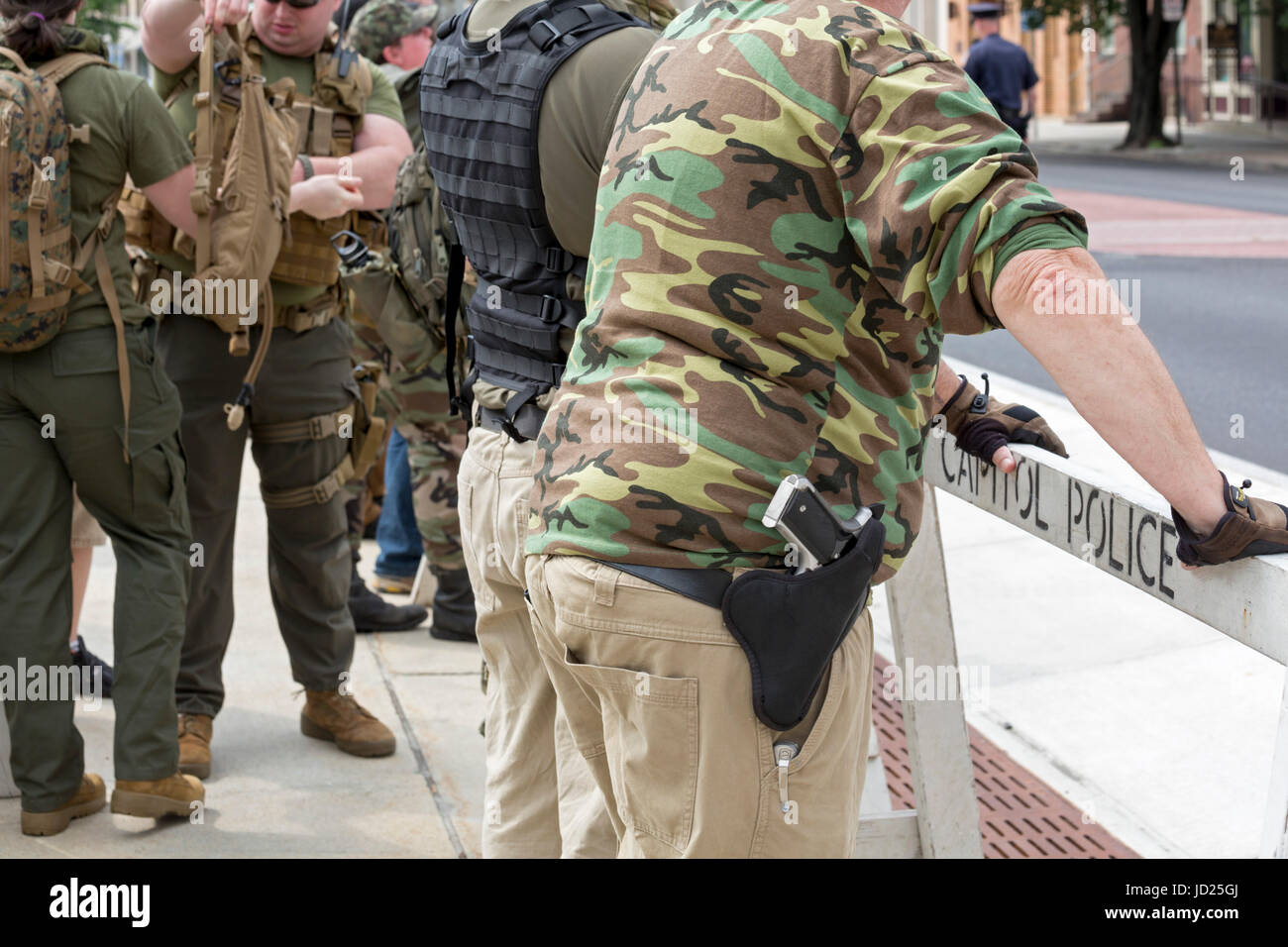 Harrisburg, Pennsylvania - Armed members of the Three Percenters, the Patriot Movement, and the Oath Keepers guarded an anti-Muslim rally organized by Stock Photo