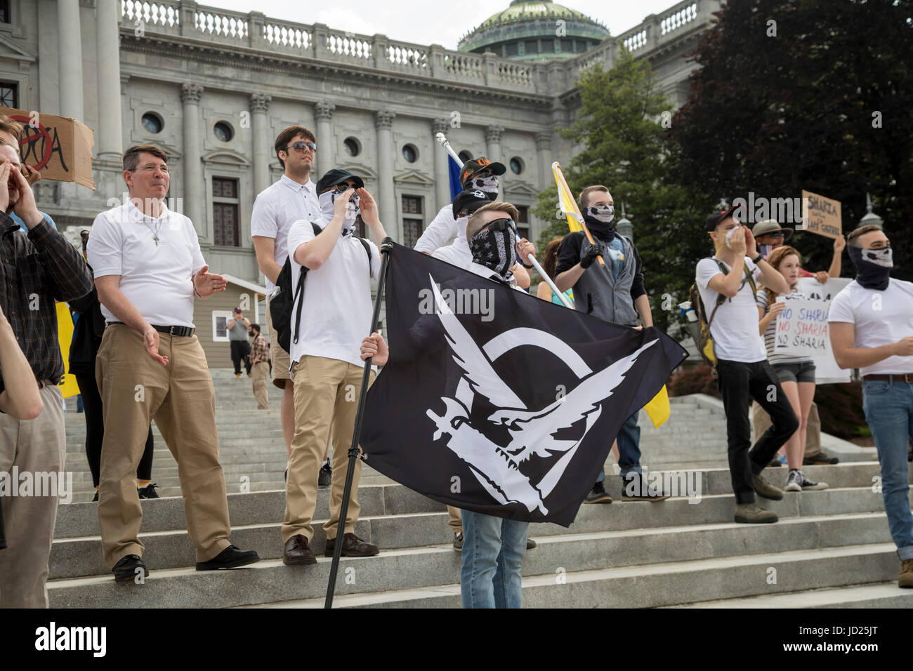 Harrisburg, Pennsylvania - Members of Vanguard America, many of them wearing masks, joined an anti-Sharia, anti-Muslim rally called by ACT for America Stock Photo