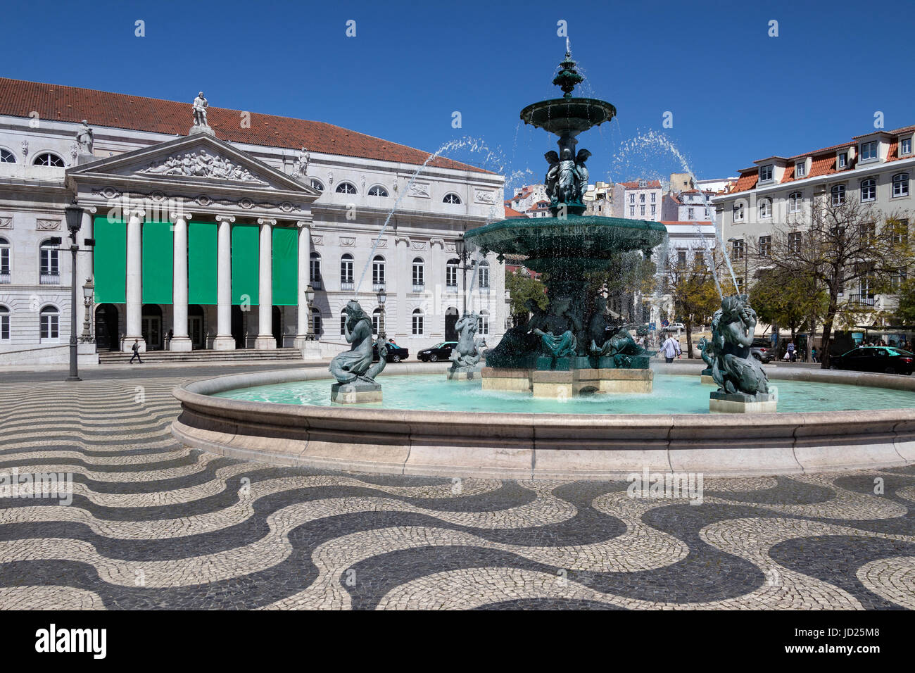 City of Lisbon - Portugal. Fountain near the Teatro National Theater in Rossio Square (official name - Praca de D. Pedro IV). Stock Photo