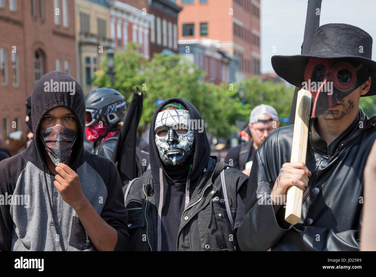 Harrisburg, Pennsylvania - Black Bloc anarchists counter-demonstrate against an anti-Muslim, anti-sharia rally organized by ACT for America at the Pen Stock Photo