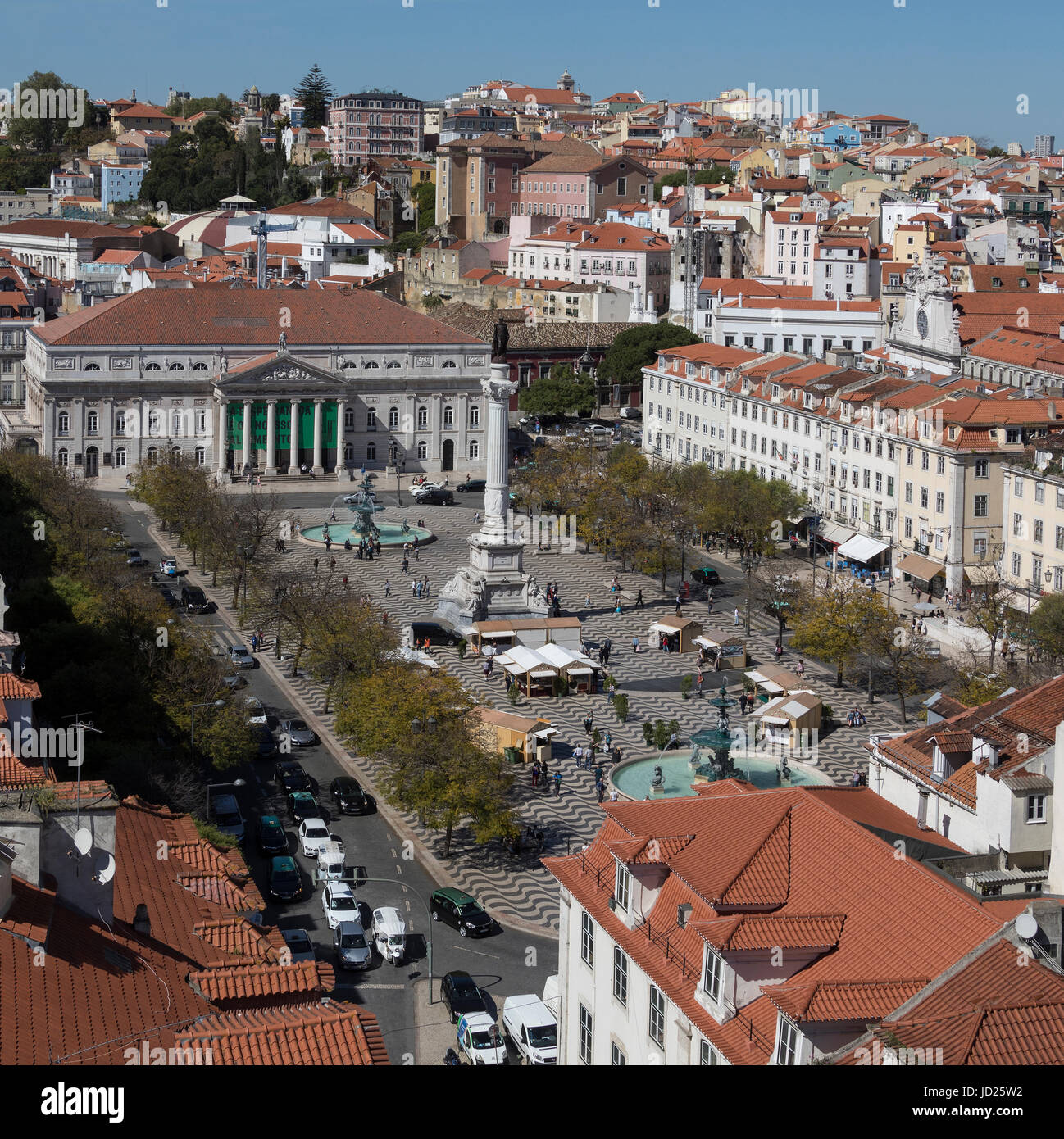 Rossio (Praca Dom Pedro IV) and the National Theater (Teatro Nacional Dona Maria II) in the city center of Lisbon in Portugal. Stock Photo