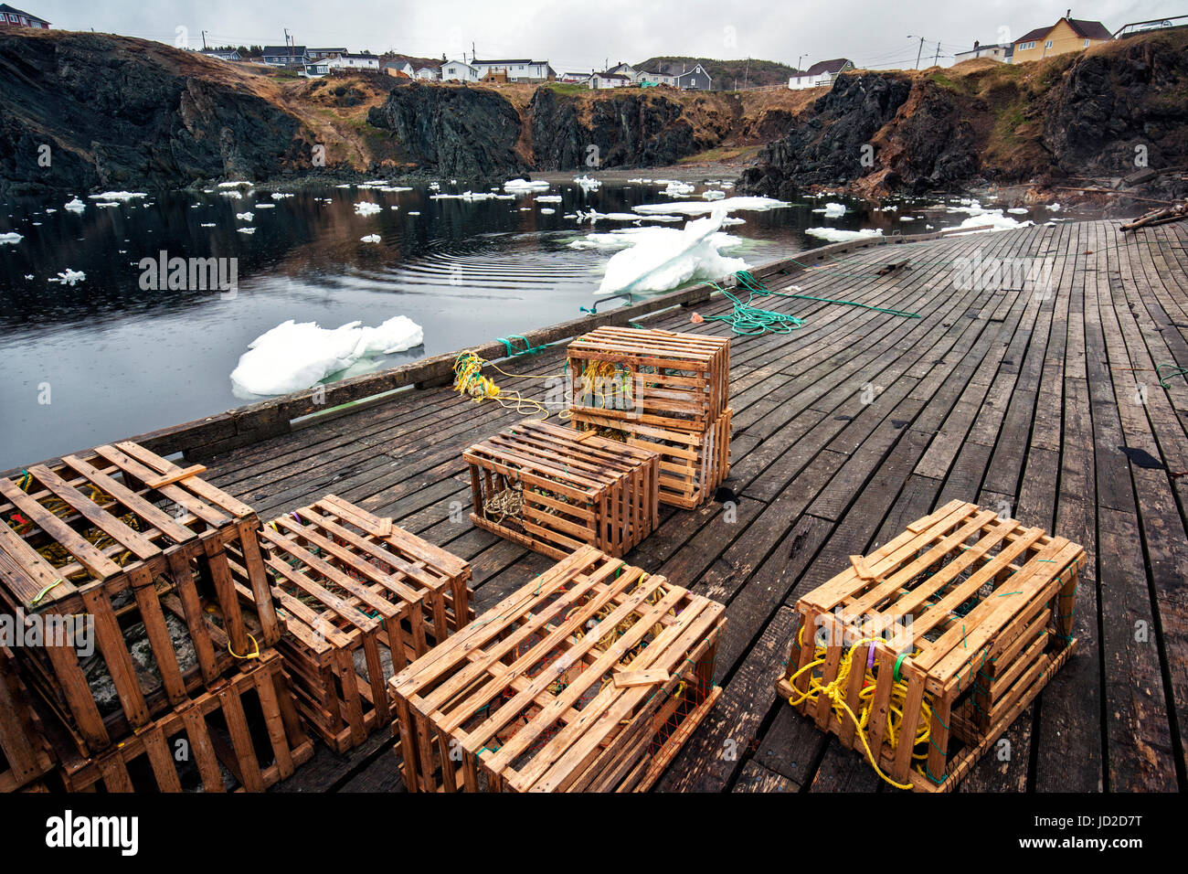 Wooden lobster traps on dock in Crow Head, Twillingate, Newfoundland, Canada Stock Photo