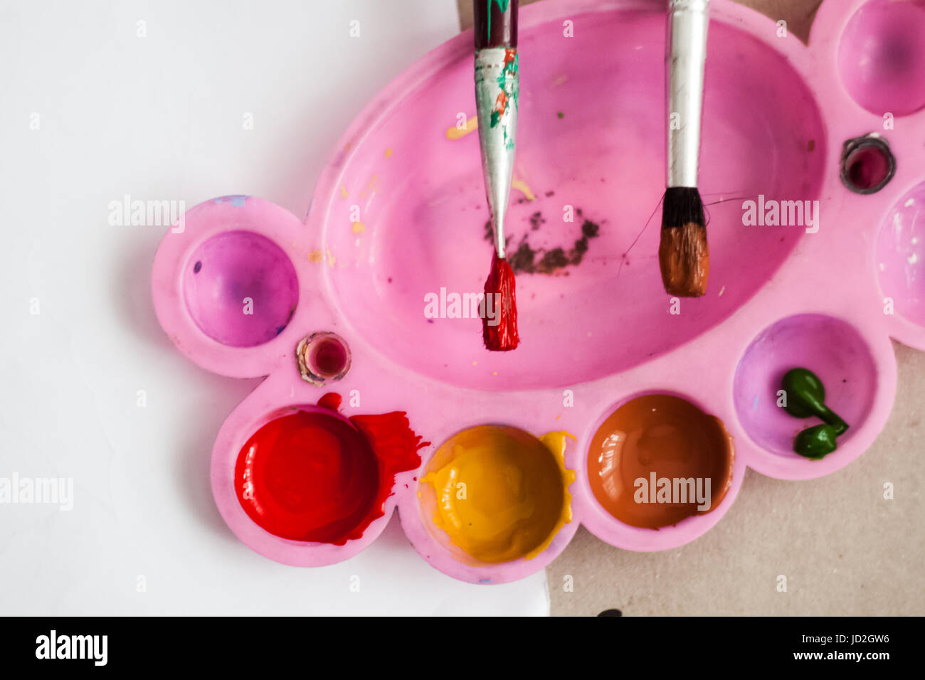 Palette of tempera, paint, brushes Stock Photo Alamy