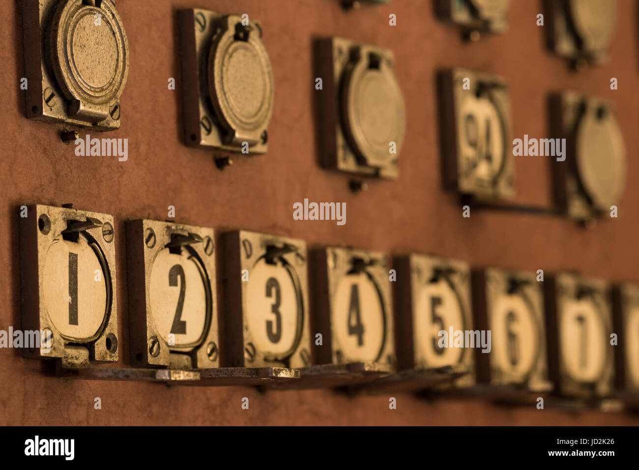 Number flaps used on old telephone exchange board. Stock Photo
