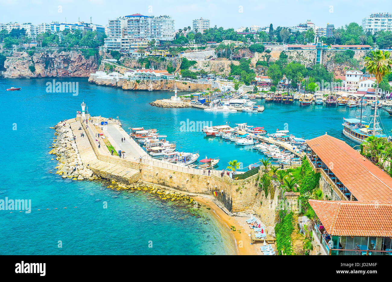 Kaleici district is historic city center with the large port, surrounded by fortress walls and rocky cliffs, Antalya, Turkey. Stock Photo
