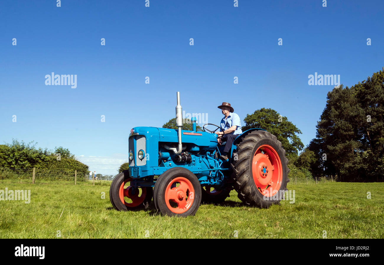 Neil Corner drives a 1962 Fordson Super Major during the 39th North Yorkshire County Show on the Camp Hill Estate in Yorkshire. Stock Photo