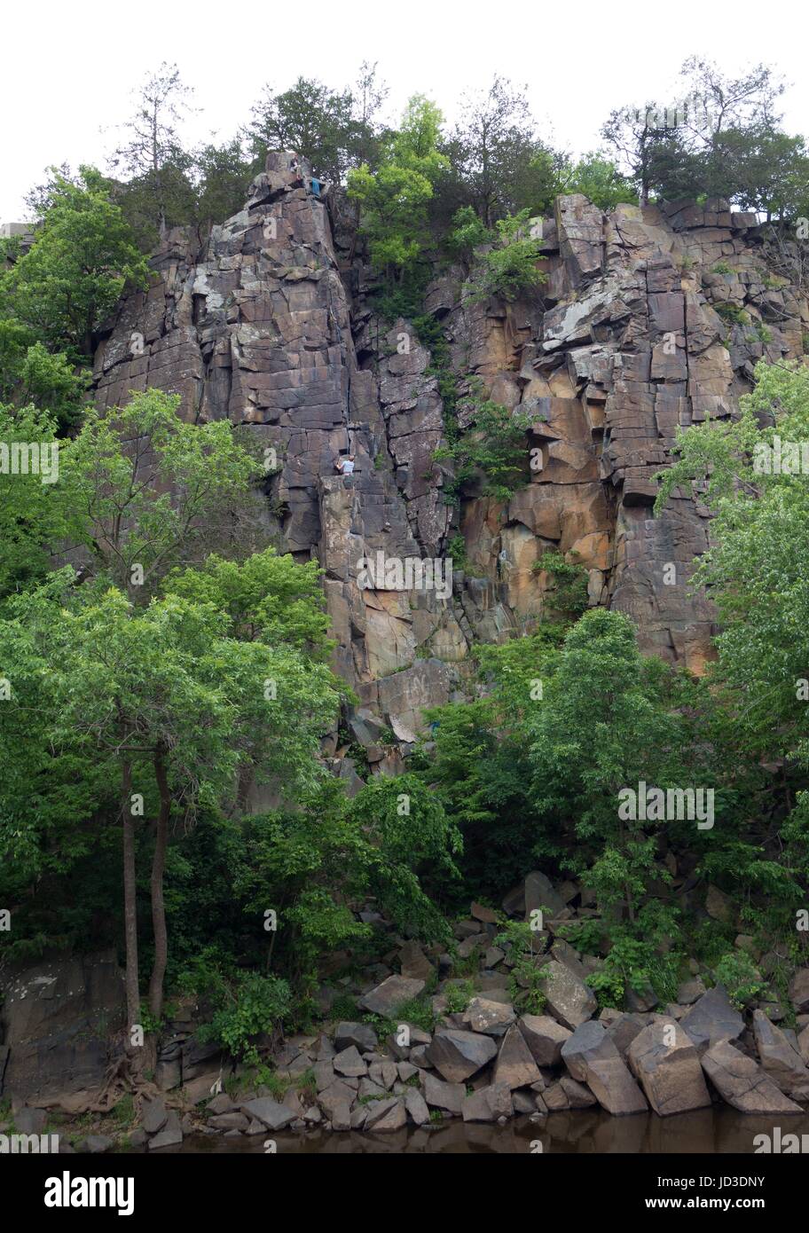 Rock climbers climbing a sheer rock wall near Taylors Falls, Minnesota, USA Stock Photo Alamy