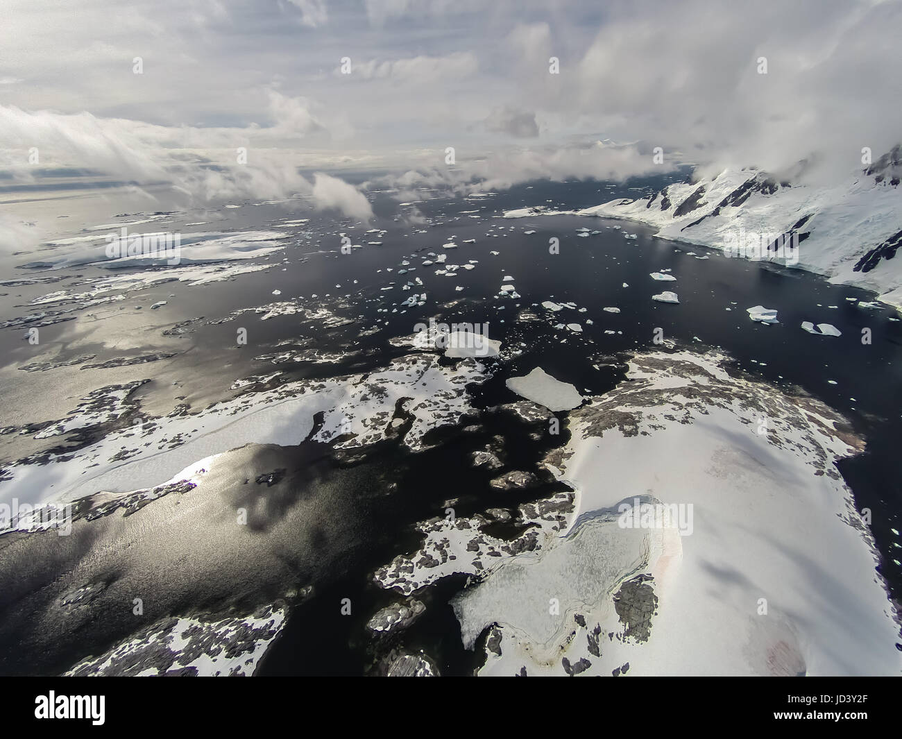 Rare aerial footage around Pleneau Island, Antarctica. Really high above ground. Stock Photo