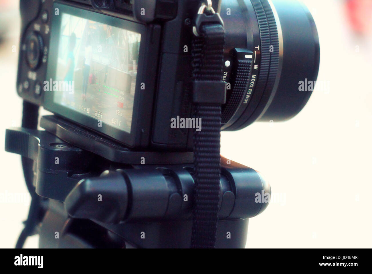 The digital video camera on the tripod Stock Photo Alamy