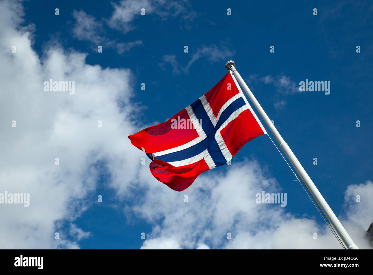 Flag of norway waving on a blue sky Stock Photo - Alamy