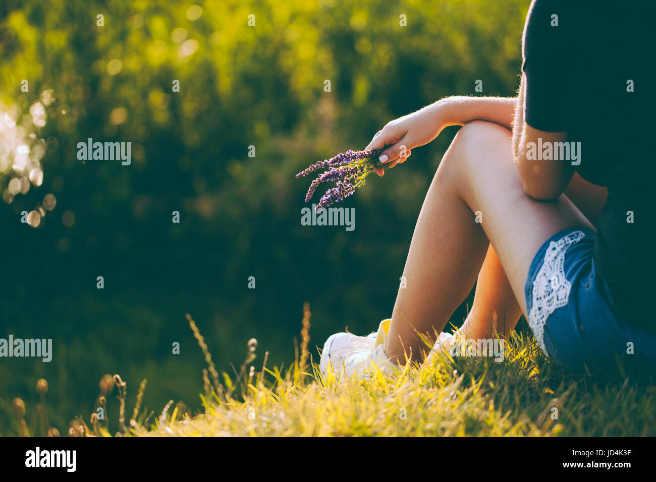 Relaxing woman in nature Stock Photo - Alamy