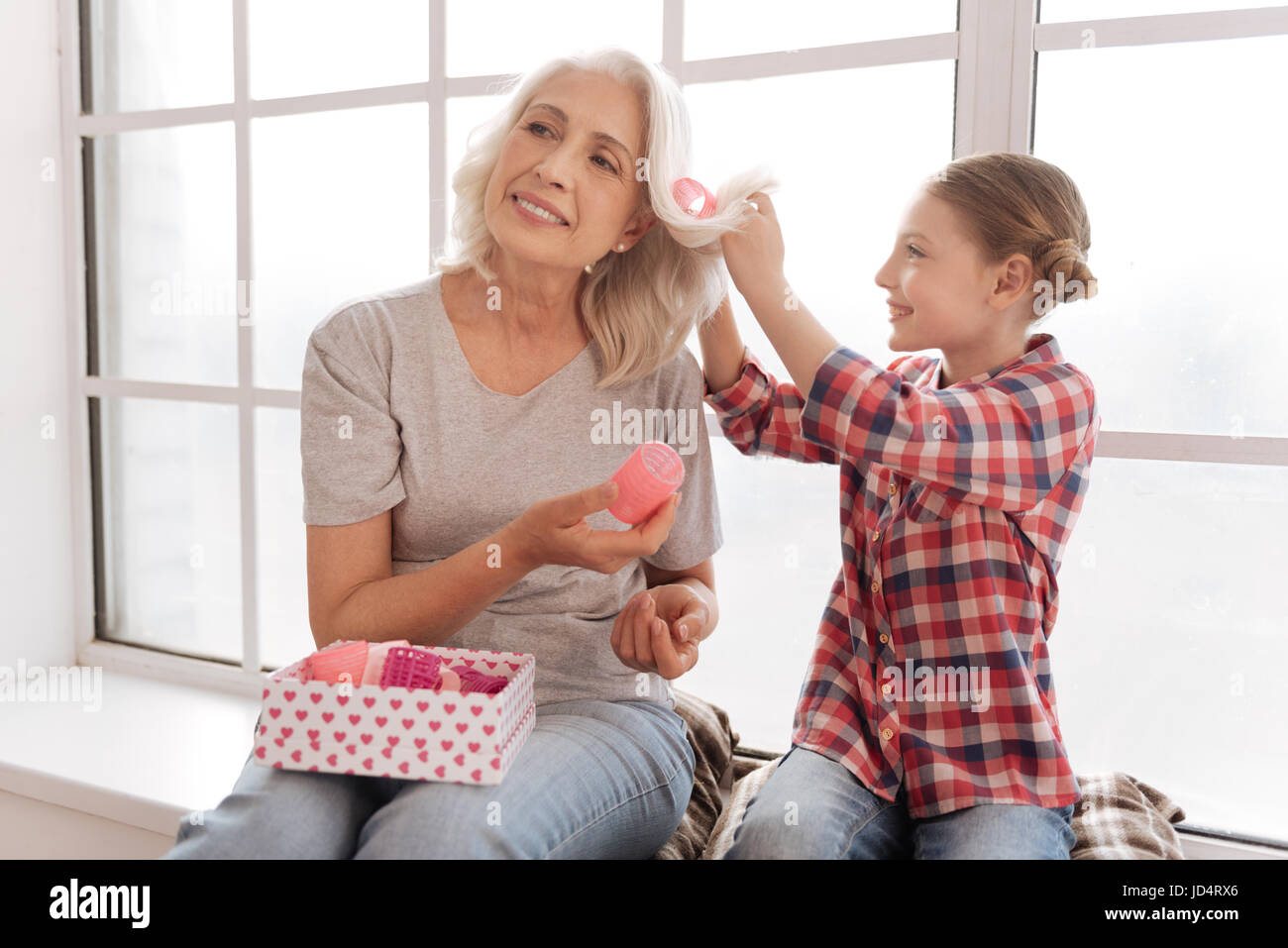 Elderly woman hair rollers hi-res stock photography and images - Alamy
