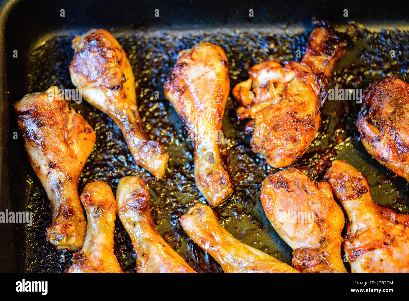 chicken wings cooking in oven in stove Stock Photo - Alamy