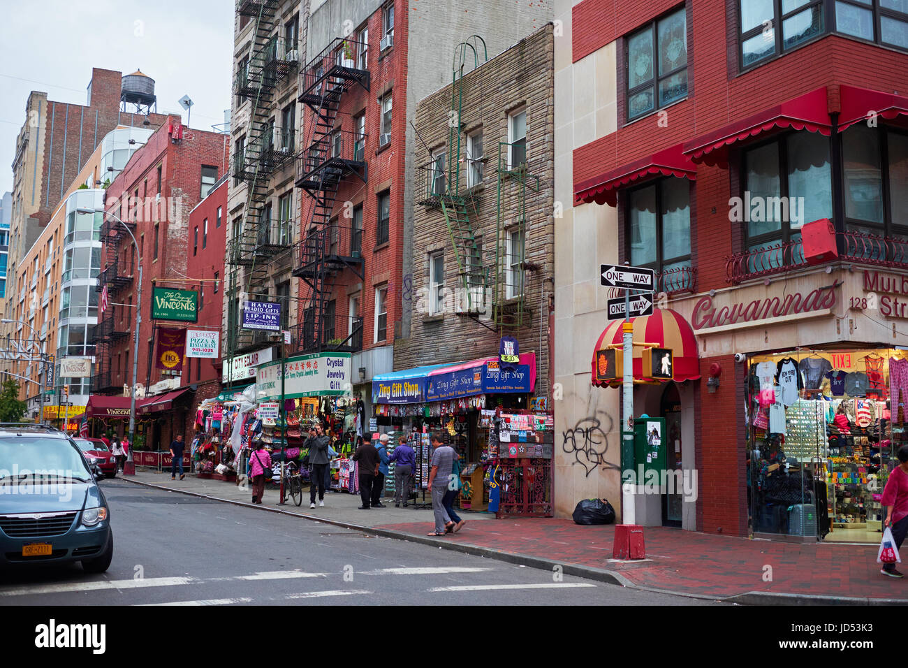 NEW YORK CITY - OCTOBER 15, 2014: Street level view of apartments and shops, corner of Mulberry St and Hester St in Chinatown Stock Photo