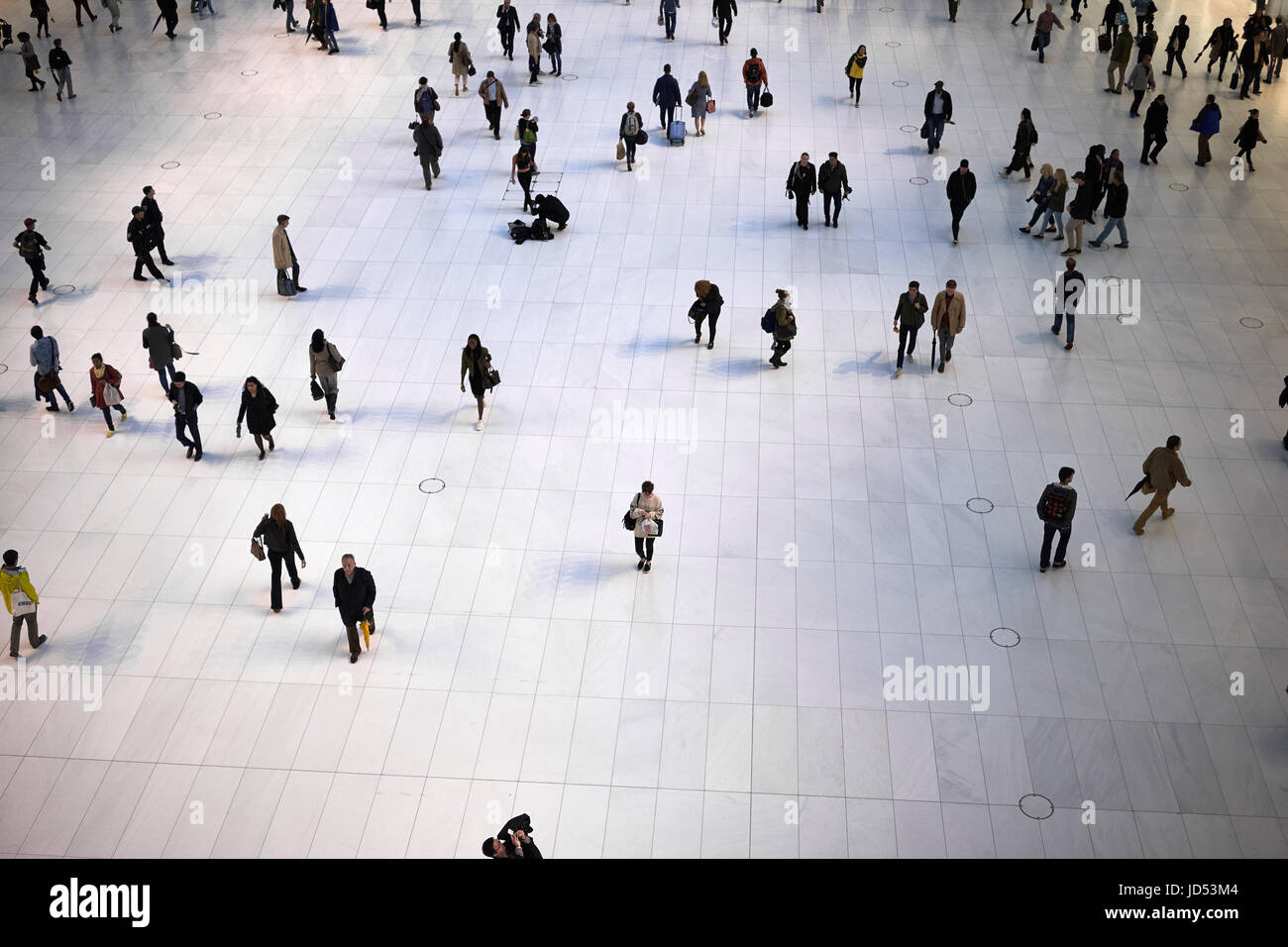 NEW YORK CITY - SEPTEMBER 30, 2016: People moving around on the ground floor of Reiss Westfield World Trade Center, looking like ants Stock Photo