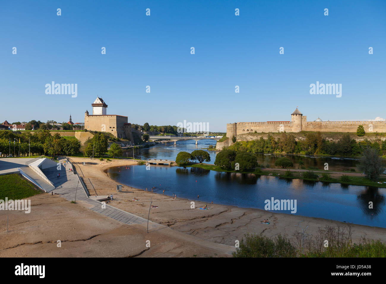 Narva and Ivangorod Fortress on the border of Estonia and Russia. Summer day panoramic view. Stock Photo