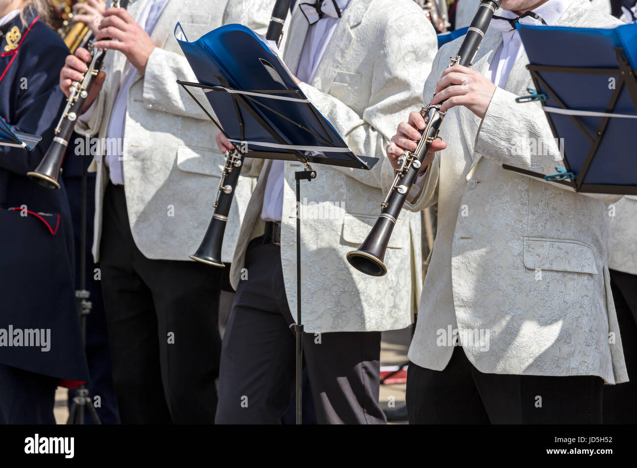 orchestra musicians playing clarinets during city music festival Stock Photo