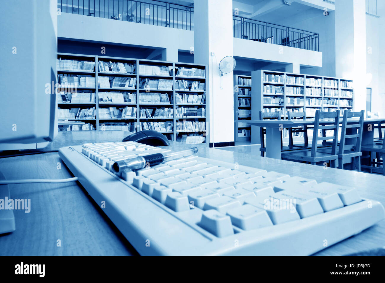 Library shelves, a large number of books. Stock Photo