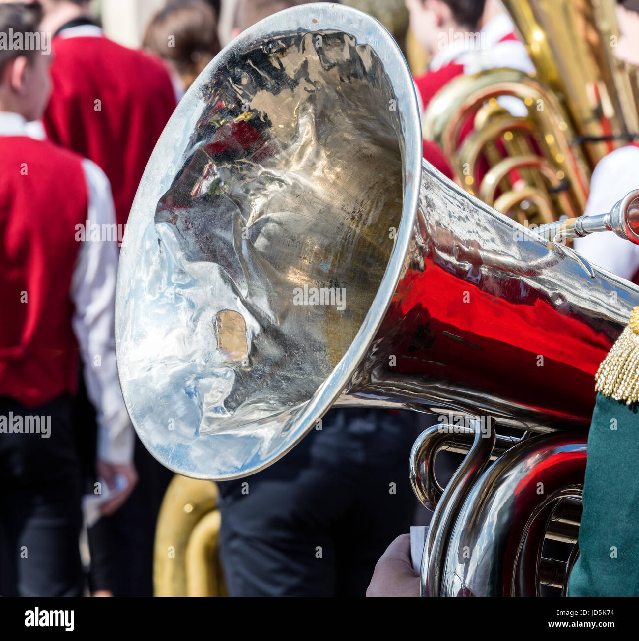 bright big brass bass tuba on blurred orchestra background Stock Photo