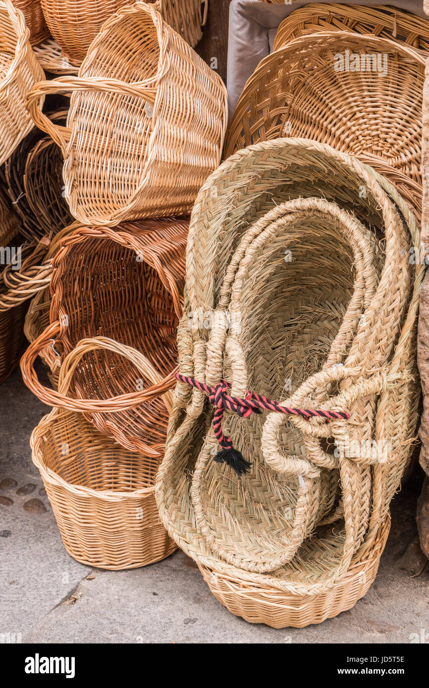 Wicker hand-made baskets at the shop of a touristic street of Segovia Castilla and Leon Spain. Stock Photo
