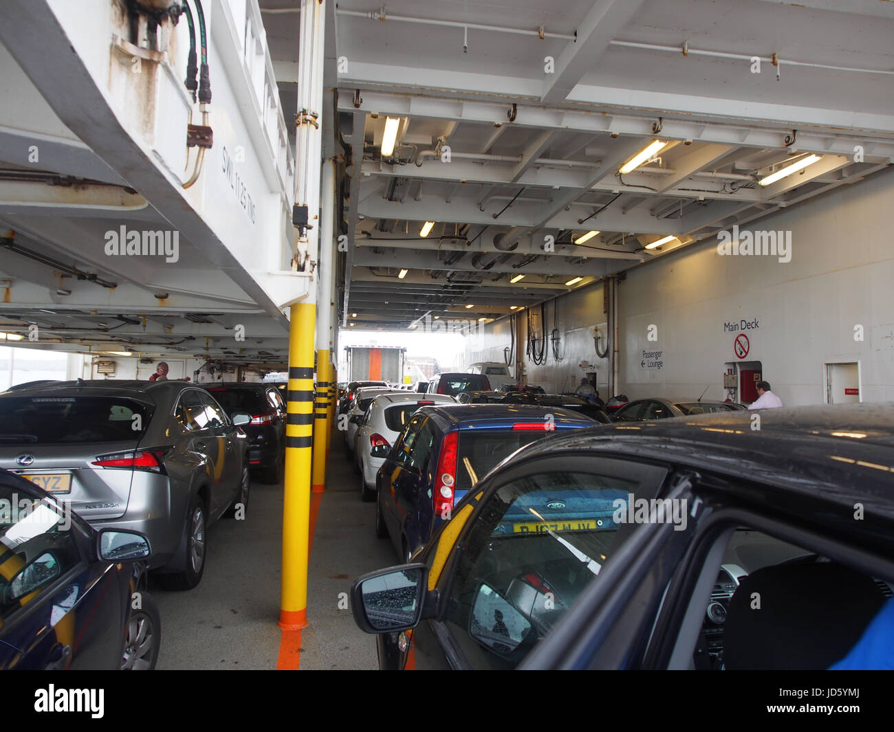 The main vehicle deck of the Portsmouth to Isle of Wight car ferry Stock Photo