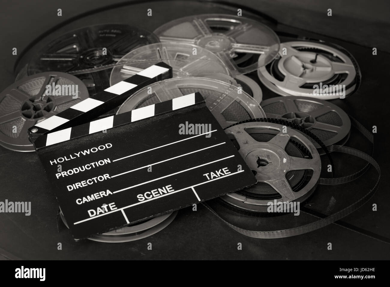 Heap of aged vintage super 8 mm movie reels, black clapper board selective  focus detail Stock Photo - Alamy