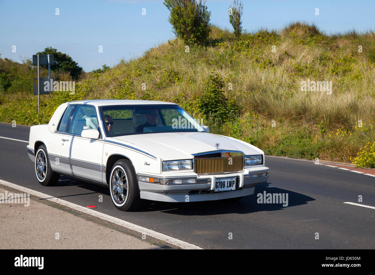1989 80s 4500cc 4.5 Litre American Cadillac V8  Classic, collectable restored vintage vehicles arriving for the Woodvale Rally, Southport, Merseyside, UK. Stock Photo