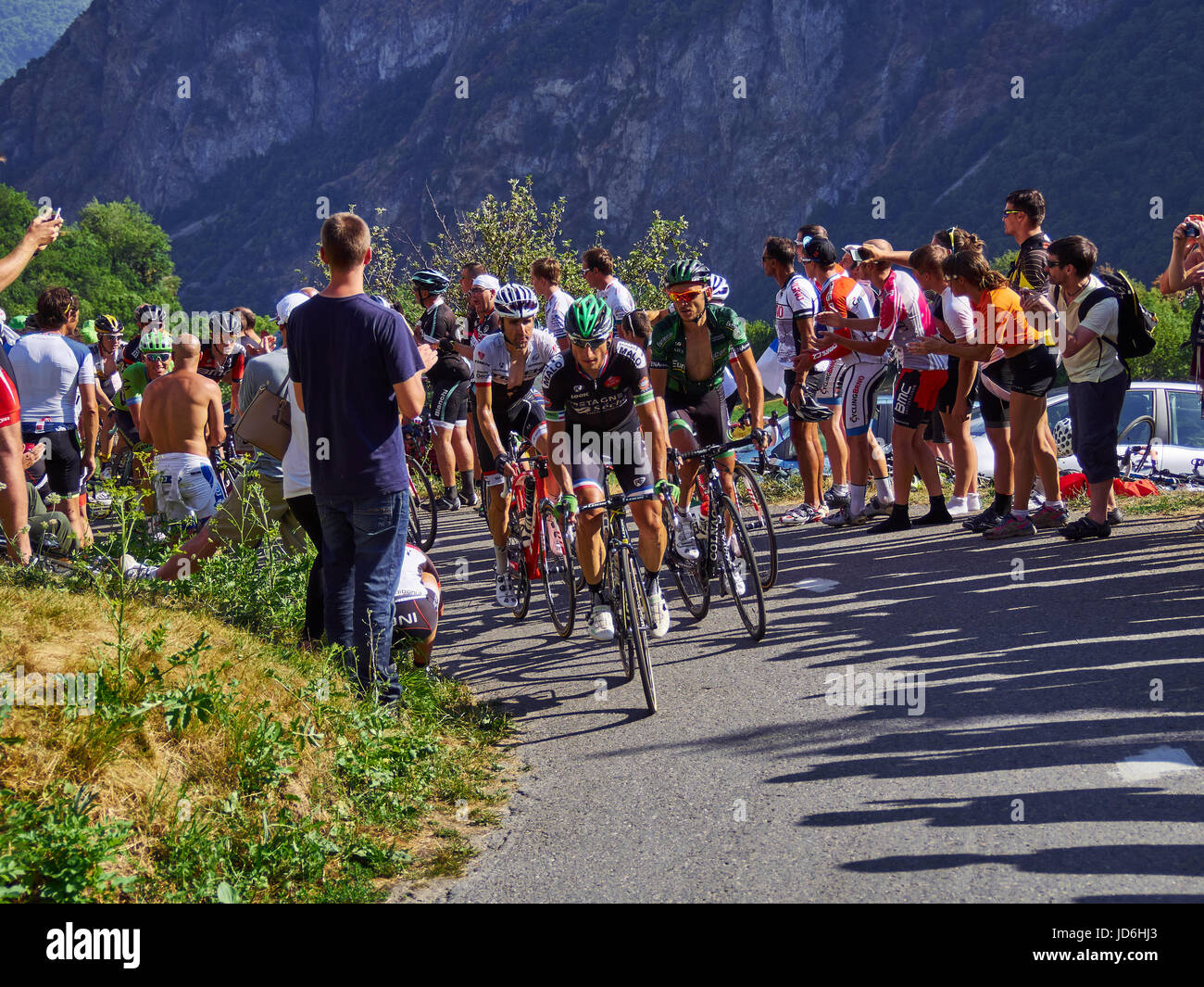 MONTVERNIER, FRANCE - JULY 23 2015: small group of riders, between spectators, heading for the top in the tour de france 2015 Stock Photo