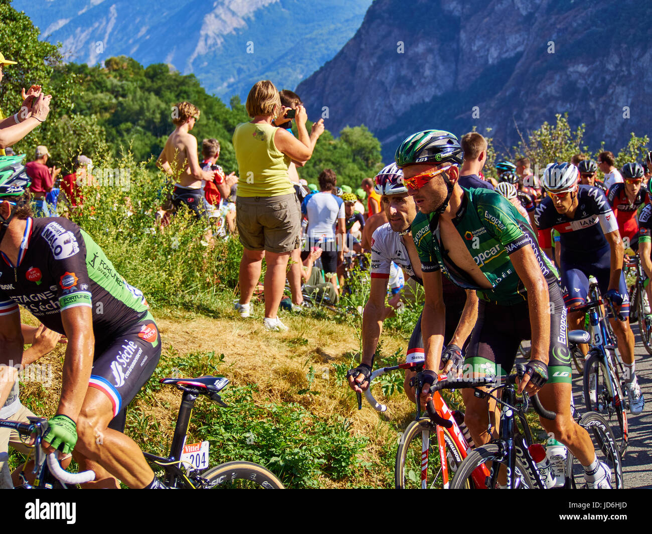 MONTVERNIER, FRANCE - JULY 23 2015: Riders in a hairpin turn on stage 18 in Tour de France 2015 Stock Photo