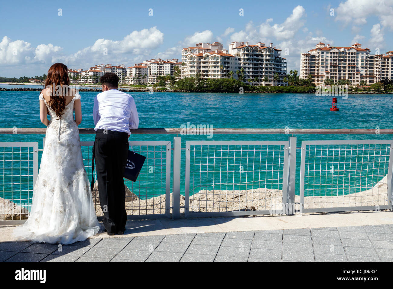 Miami Beach Florida,South Pointe Park,Government Cut,waterfront,Hispanic man men male,woman female women,couple,wedding dress,newlyweds,Fisher Island, Stock Photo