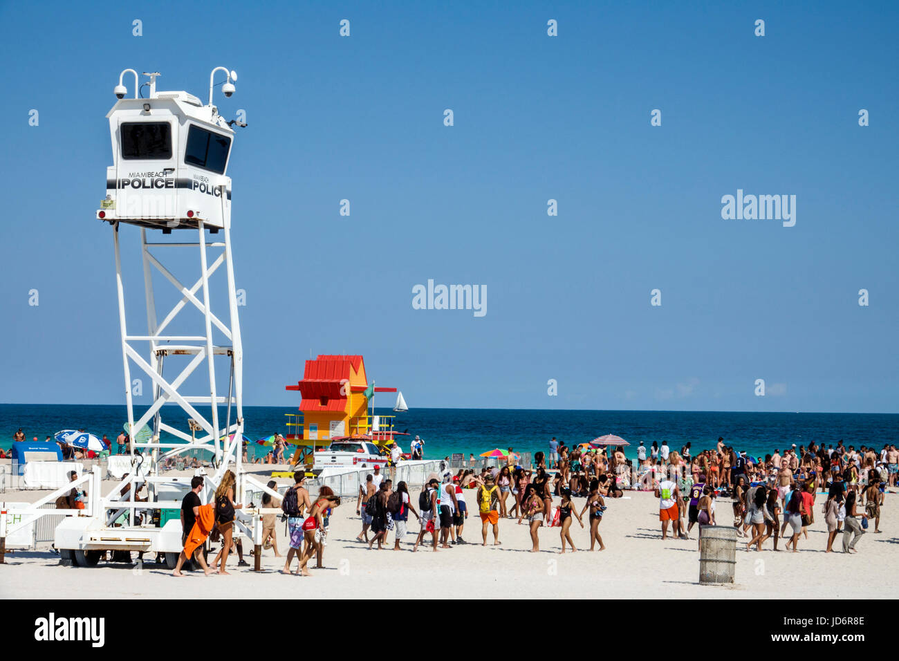 Miami Beach Florida,Atlantic Ocean,Spring Break,sand,police,observation tower,manned mobile surveillance system,Black man men male,woman female women, Stock Photo