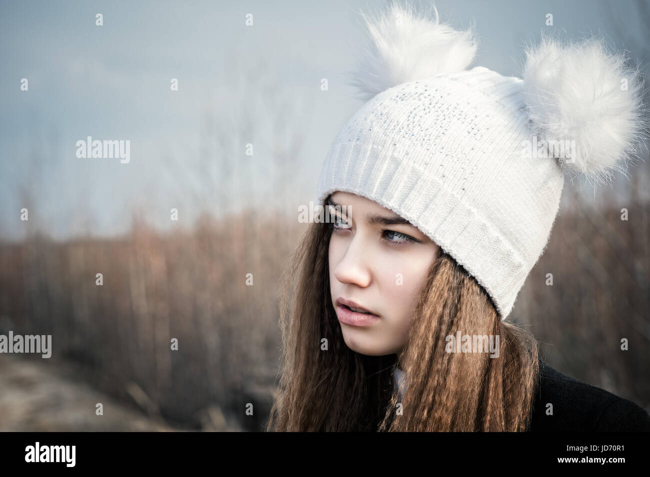 portrait beautiful teenage girl closeup in a white hat Stock Photo - Alamy
