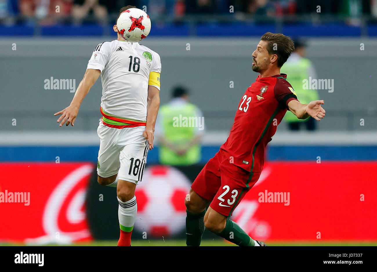 KAZAN, RT - 18.06.2017: PORTUGAL VS. MEXICO - GUARDADO Andres de México battles with ADRIEN of Portugal during a match between Portugal and Mexico valid for the first round of the Confederations Cup 2017 on Sunday (18), held at the Kazan Arena in Kazan, Russia. (Photo: Rodolfo Buhrer/La Imagem/Fotoarena) Stock Photo