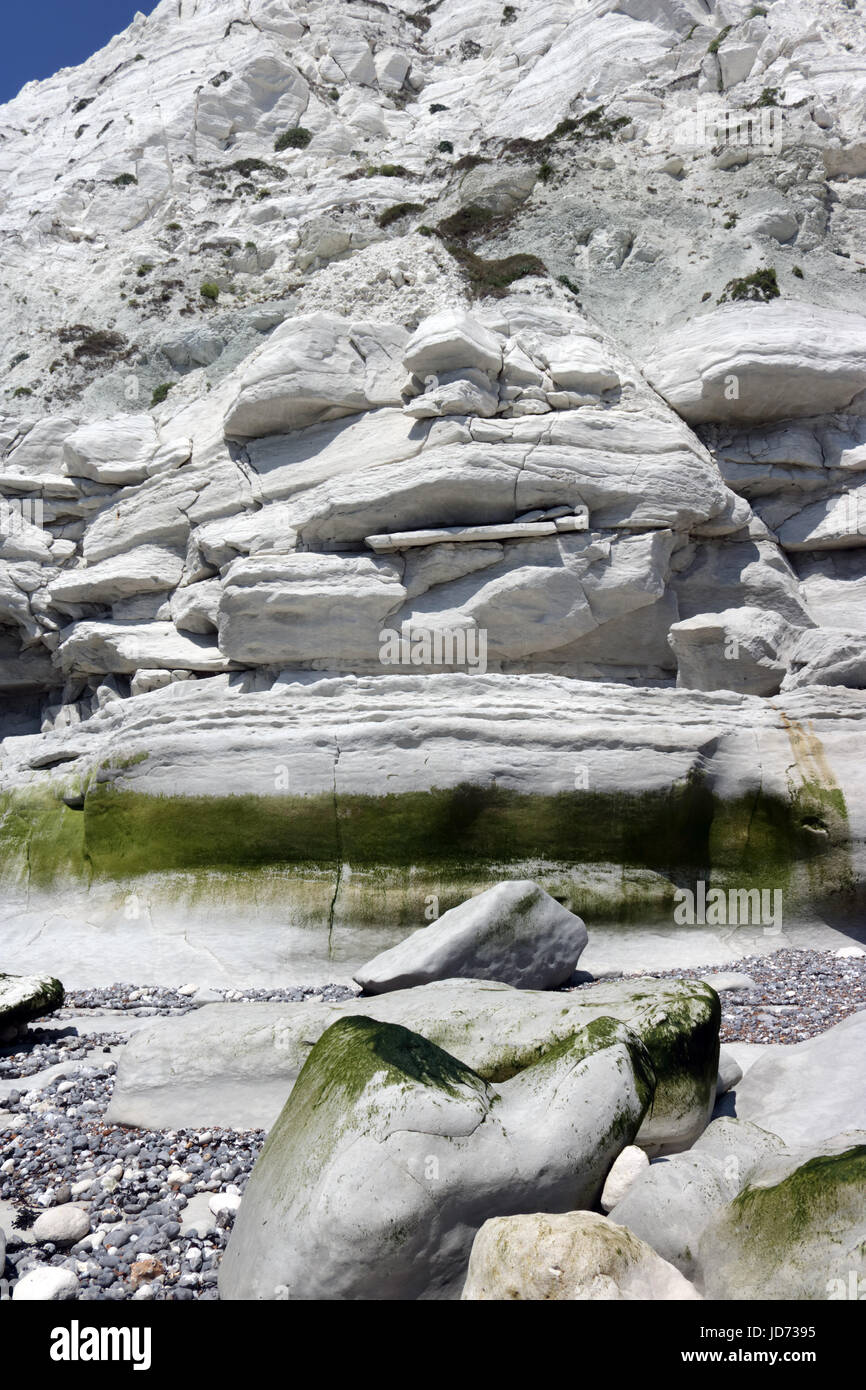 Beachy Head, East Sussex, UK. 18th June 2017. Unusual rock formations ( Jabba The Hut) in the chalk cliff beneath Beachy Head in East Sussex, where a 12.30 low tide enabled safe access to the beach, foreshore and iconic lighthouse. Credit: Julia Gavin UK/Alamy Live News Stock Photo