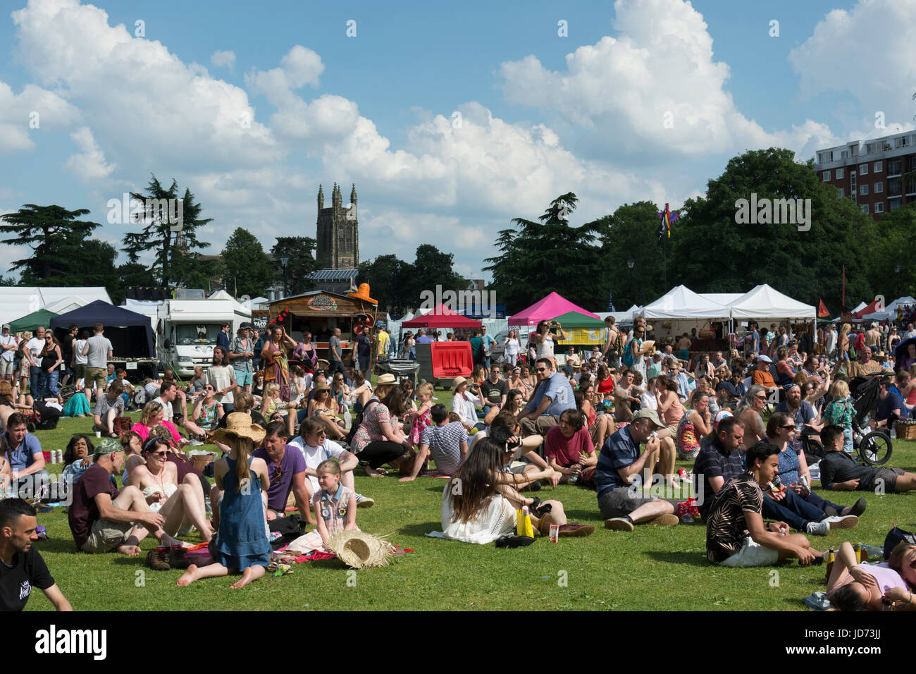 Leamington Spa, Warwickshire, England, UK. 18th June, 2017. People enjoy the sunshine at the 39th Leamington Peace Festival. The annual free festival was held over the weekend of 17th/18th June in the Pump Room Gardens in Leamington Spa. The festival included music on the Riverside Stage and the Bandstand, as well as workshops, peace talks and children`s entertainment. Credit: Colin Underhill/Alamy Live News Stock Photo