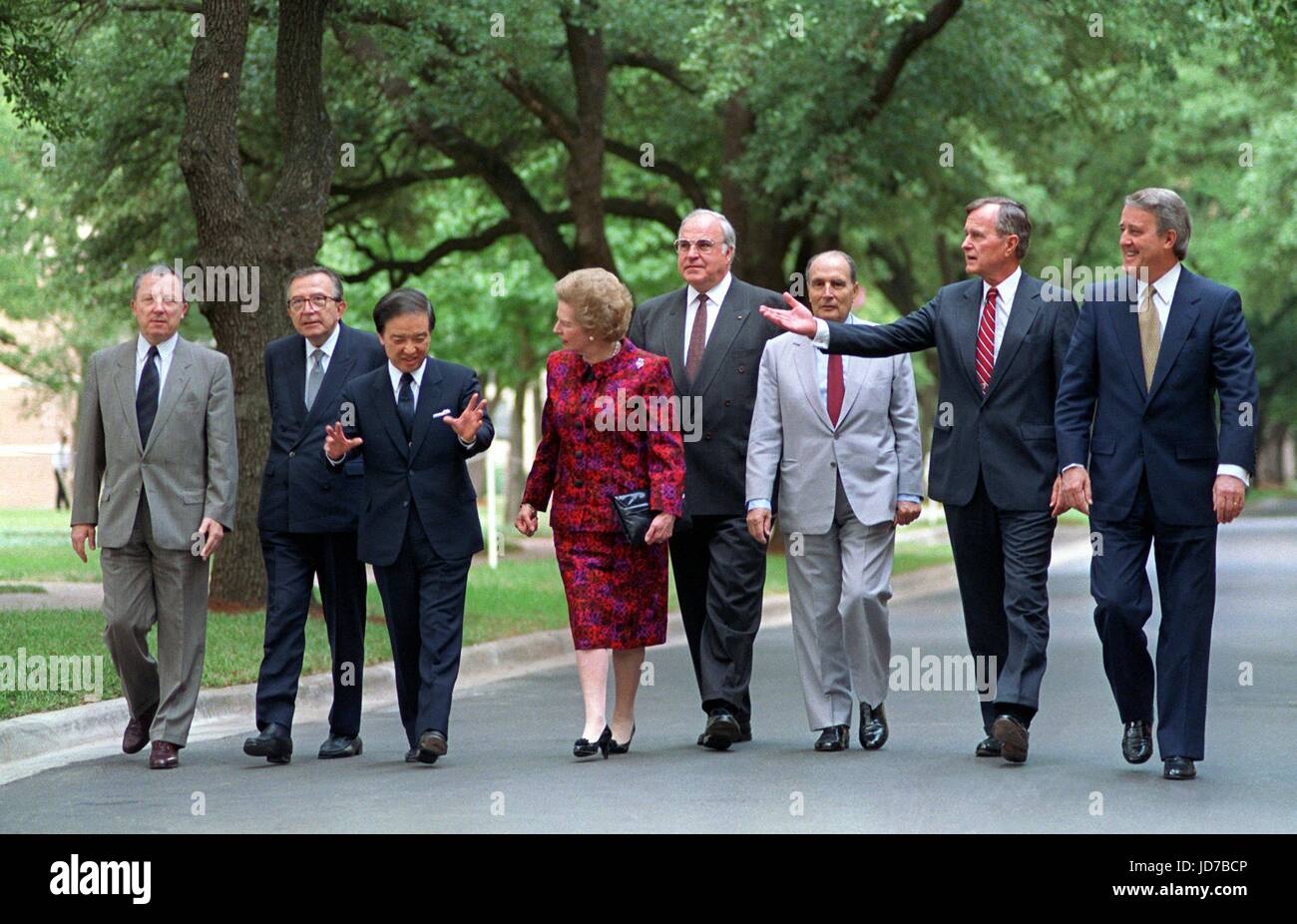 ARCHIVE - (L-R): President of the European Commission, Jacques Delors, the Italian prime minister Giulio Andreotti, the Japanese prime minister Toshiki Kaifu, the British prime minister Margaret Thatcher, Former German chancellor Kohl, French president Francois Mitterrand, US president George Bush and Canadian prime minister Brian Mulroney can be seen in Houston, USA, 11 July 1990. The G7 summit ended without concrete result after three days. Kohl passed away at the age of 87 in Eggershaim on the 16th of June 2017. He was chancellor for 16 years and head of the party CDU for quarter of a centu Stock Photo