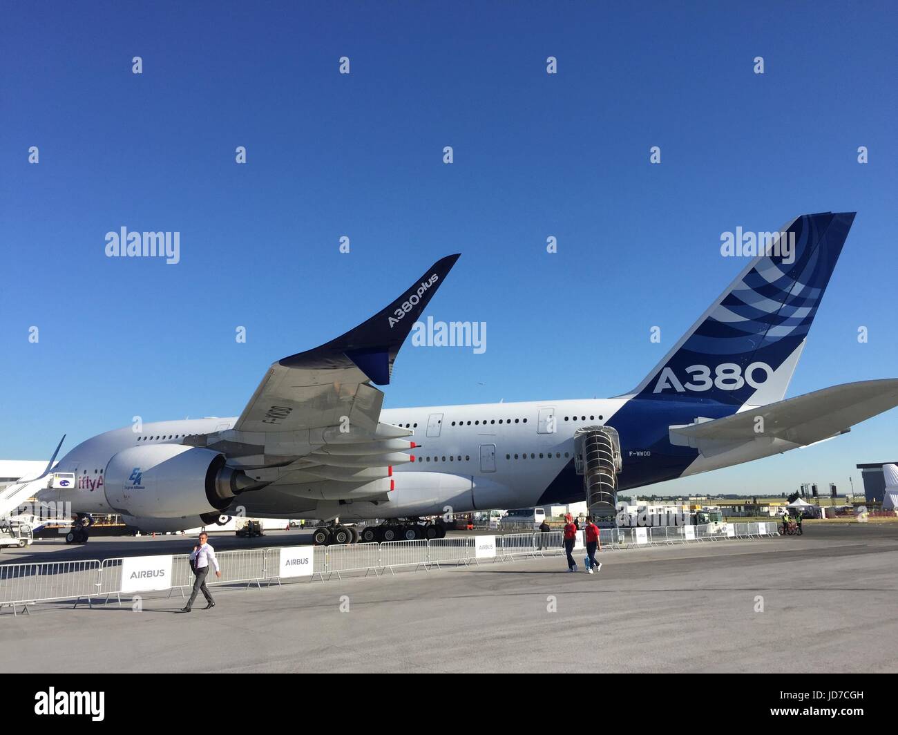An Airbus A380 with a model of the new, larger, bended wings ('A380plus') can be seen on the premoses of the Paris Airshow in Le Bourget, France, 19 June 2017. The airplane constructor Airbus is altering its unpopular model A380 - with bended wings the fuel usage may go down by four percent, the manufacturer said according to a development study report, also named 'A380plus'. Photo: Sebastian Kunigkeit/dpa Stock Photo