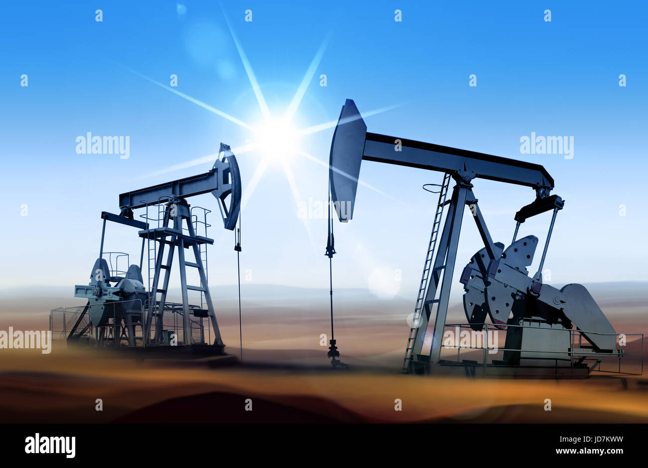 Working oil pumps in desert place of Middle East Stock Photo