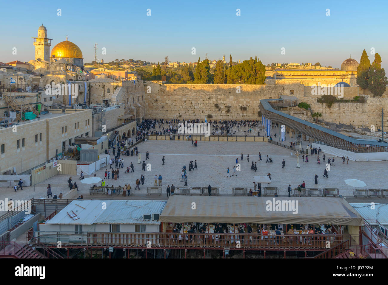 JERUSALEM, ISRAEL - April 18, 2015: The Temple Mount - Western Wall and the golden Dome of the Rock mosque in the old city of Jerusalem, Israel Stock Photo