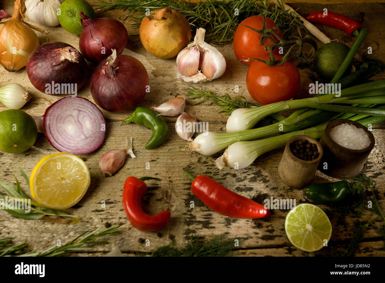 whole and sliced vegetables herbs and spices still life Stock Photo