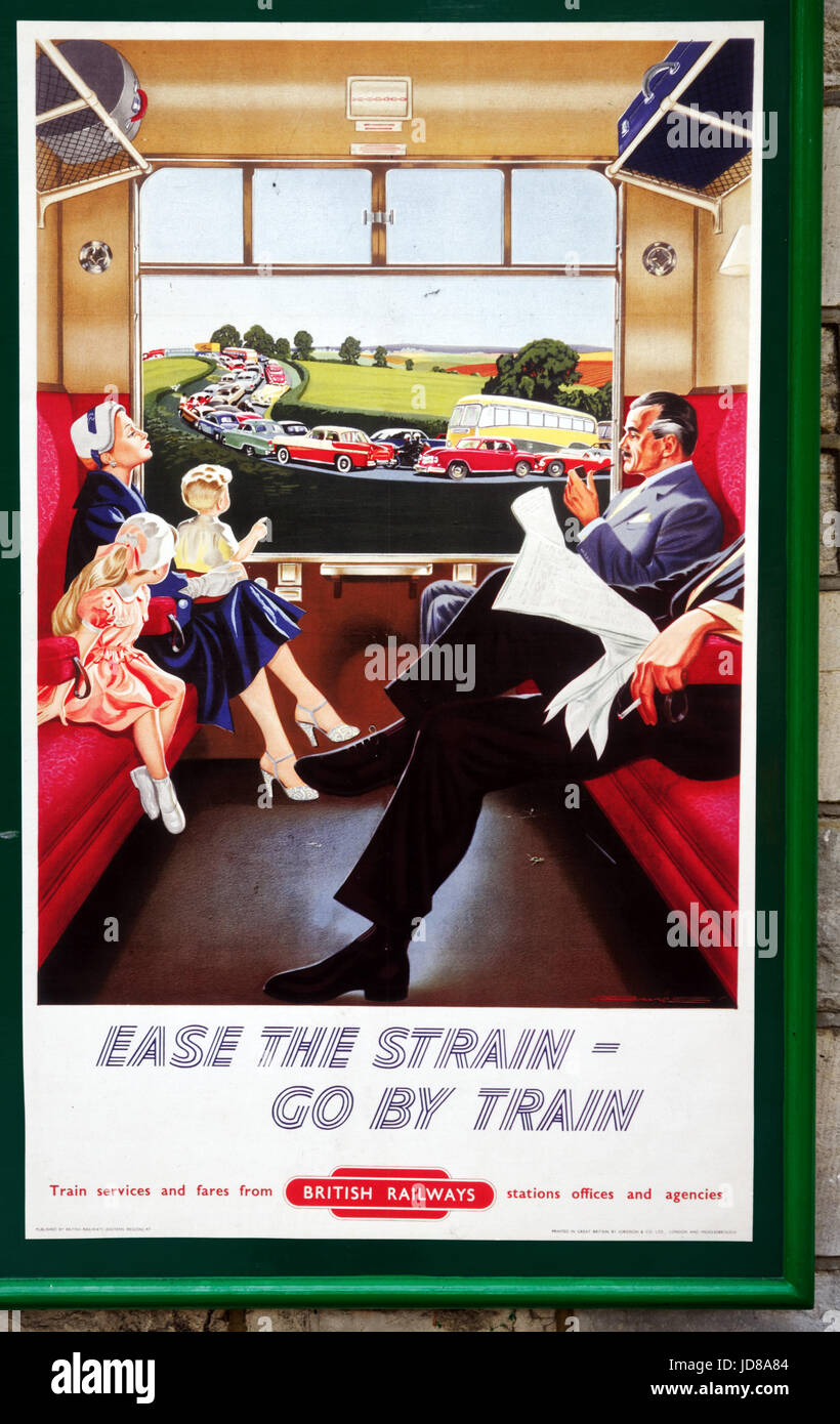 Old fifties style British Railways poster promoting train travel with the slogan Ease the Strain - Go By Train on the Swanage steam railway Stock Photo