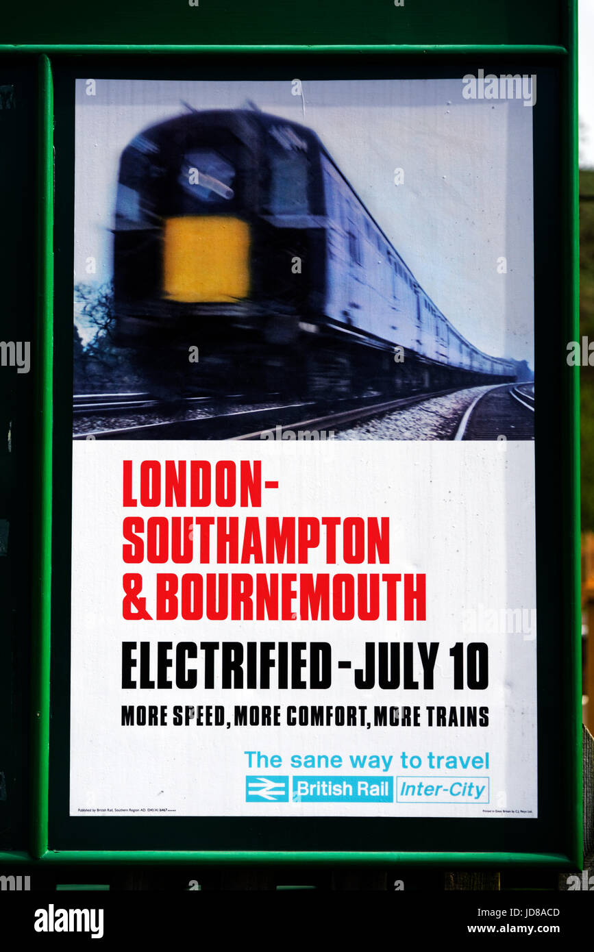 Old fifties style British Railways poster promoting the electrification of the London to Bournemouth Southampton line on the Swanage steam railway Stock Photo