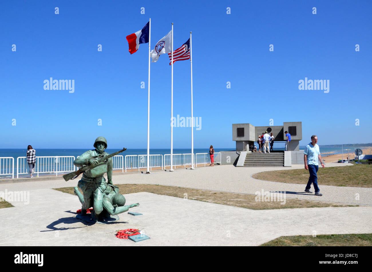 VIERVILLE-SUR-MER, FRANCE - AUG 12:  The 116th Regimental Combat Team Statue and Plaque is shown at Omaha Beach in Vierville-sur-Mer, France on August Stock Photo