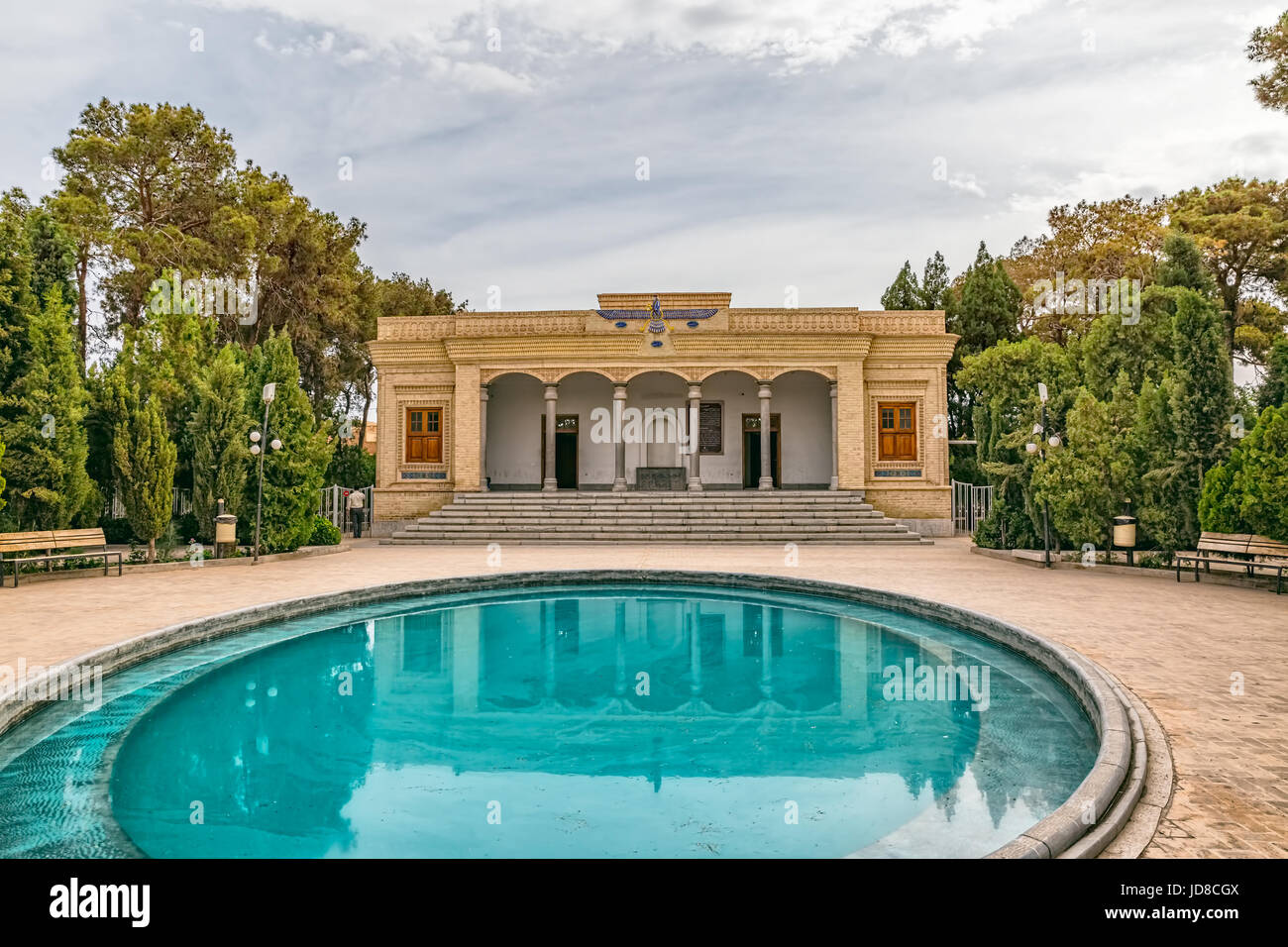 YAZD, IRAN - MAY 5, 2015: Tourists visiting the zoroastrian fire temple Atash Behram in old city. Stock Photo