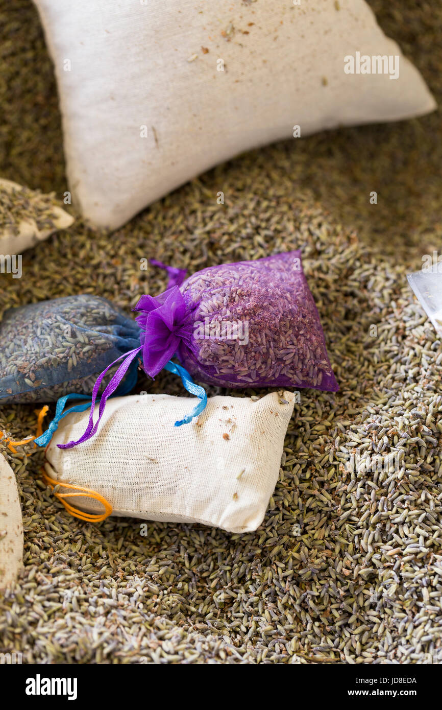 Dry lavender petals and filled satchels Stock Photo