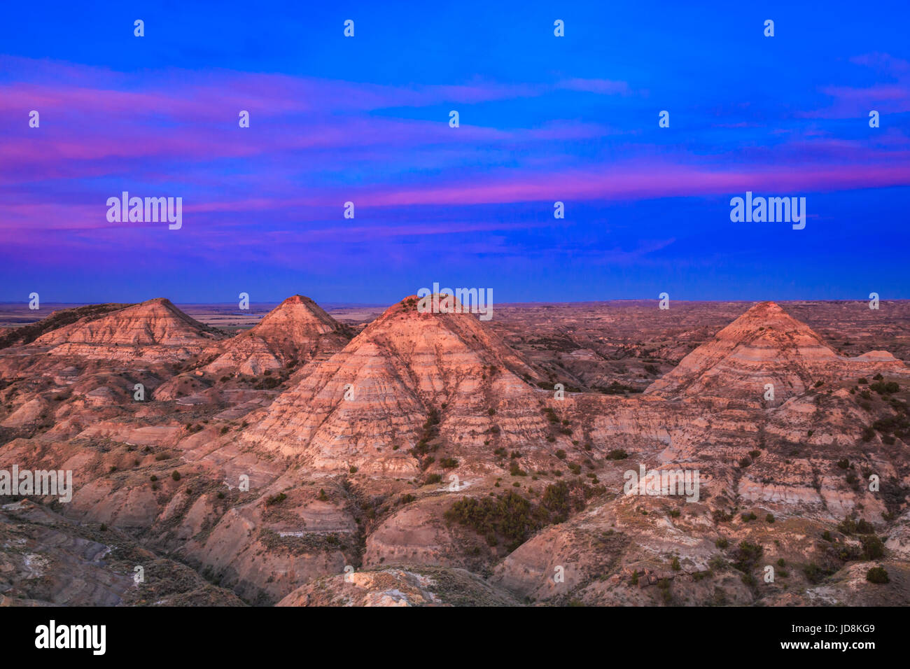 sunrise over haystack buttes in the terry badlands near terry, montana Stock Photo Alamy