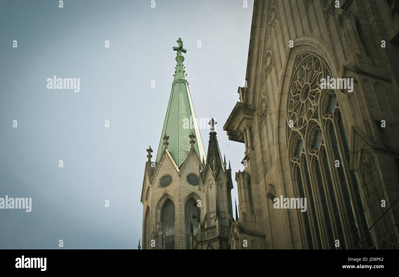 Low angle view of church tower against blue sky Stock Photo - Alamy