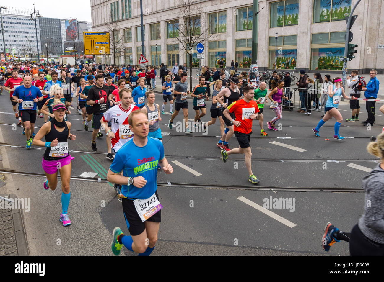 BERLIN APRIL 02, 2017 The annual 37th Berlin Half Marathon. Athletes run on KarlLiebknecht