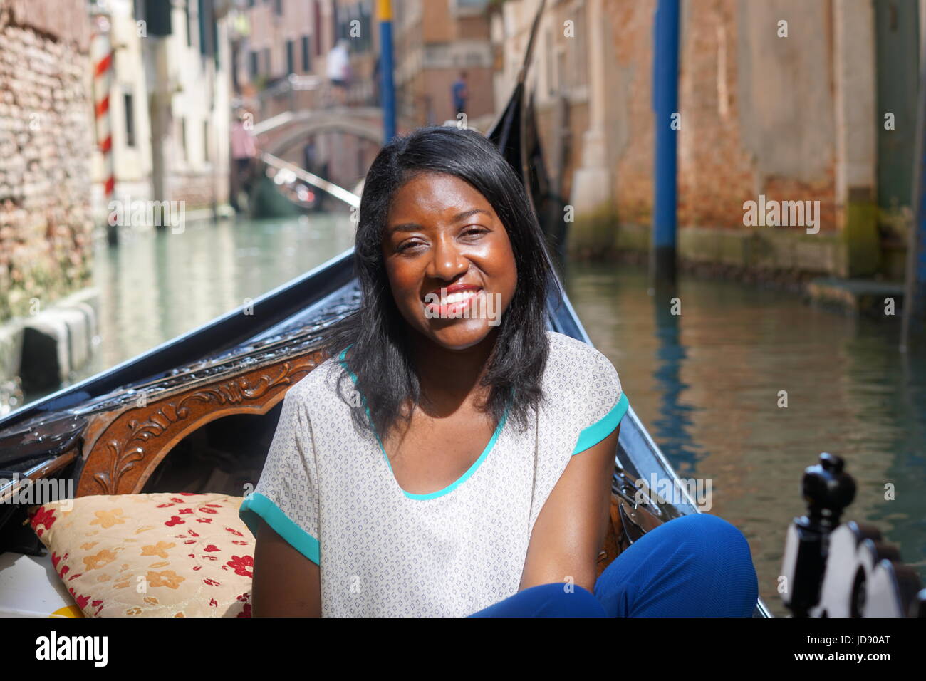 Beautiful Black Woman on Gondola Ride in Venice Stock Photo